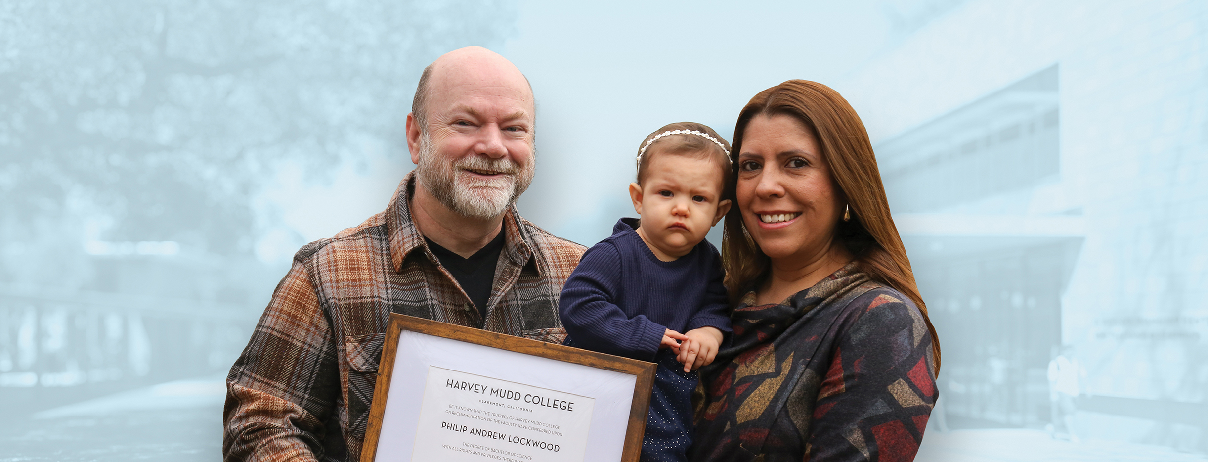 Phil Lockwood with wife and baby