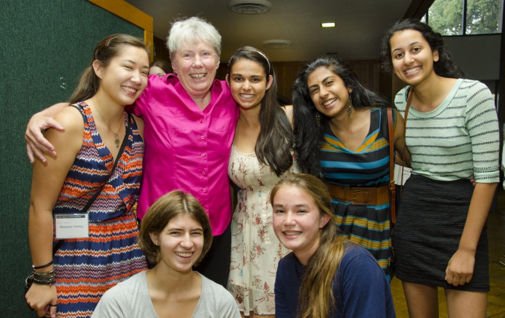 Maria Klawe poses with students