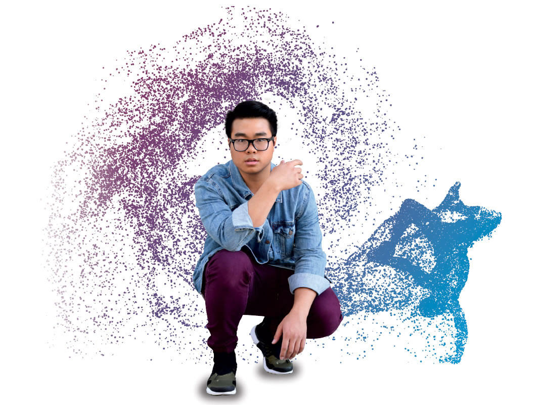 Lam Huynh squatting with abstract background.