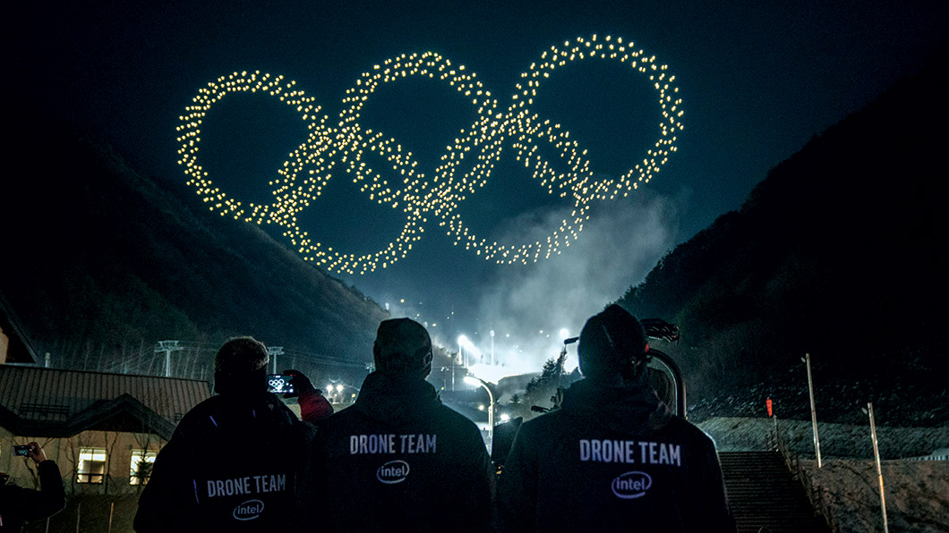 Drones form shape of the Olympic rings in the night sky.